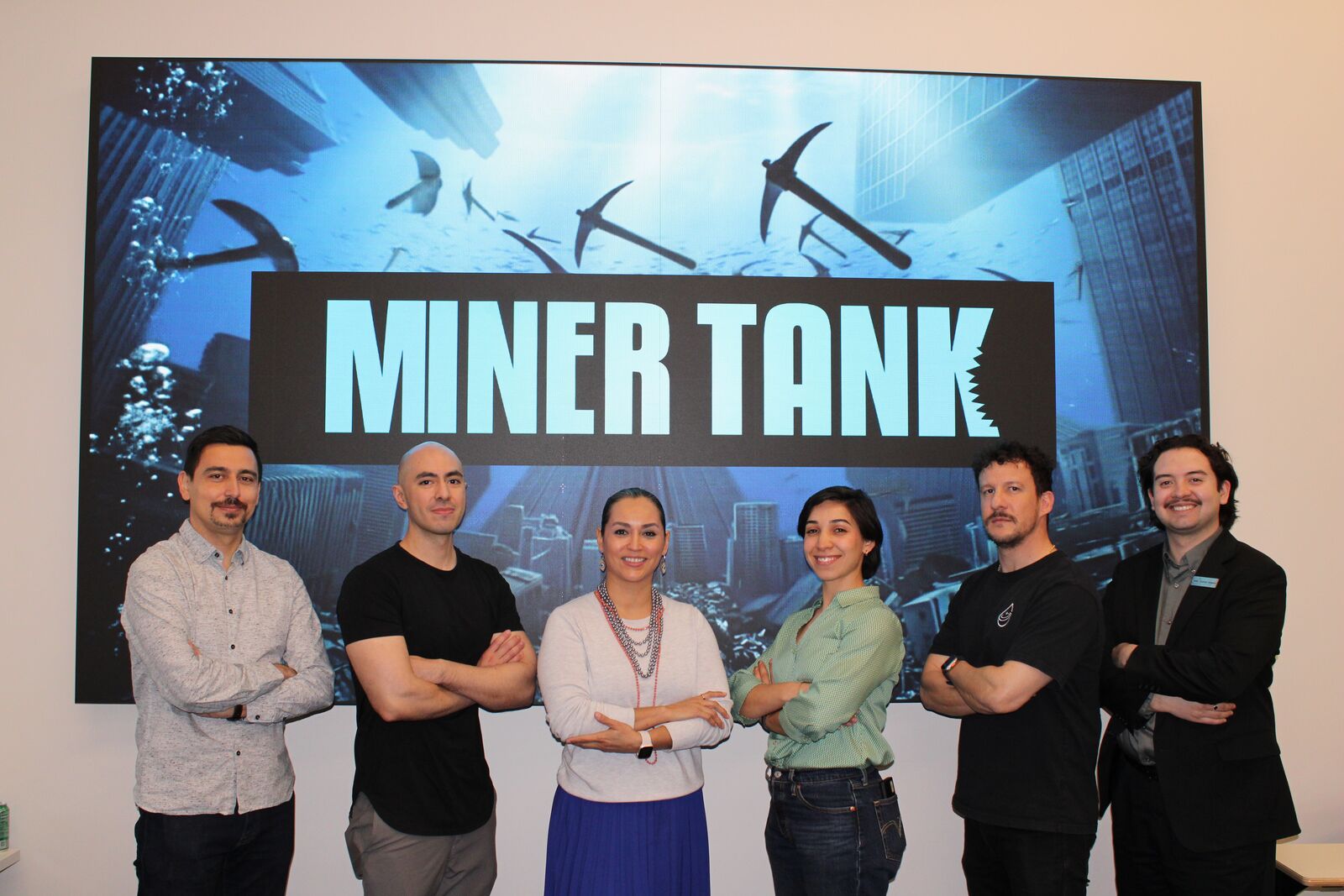 Group photo of judges at the Miner Tank pitch competition